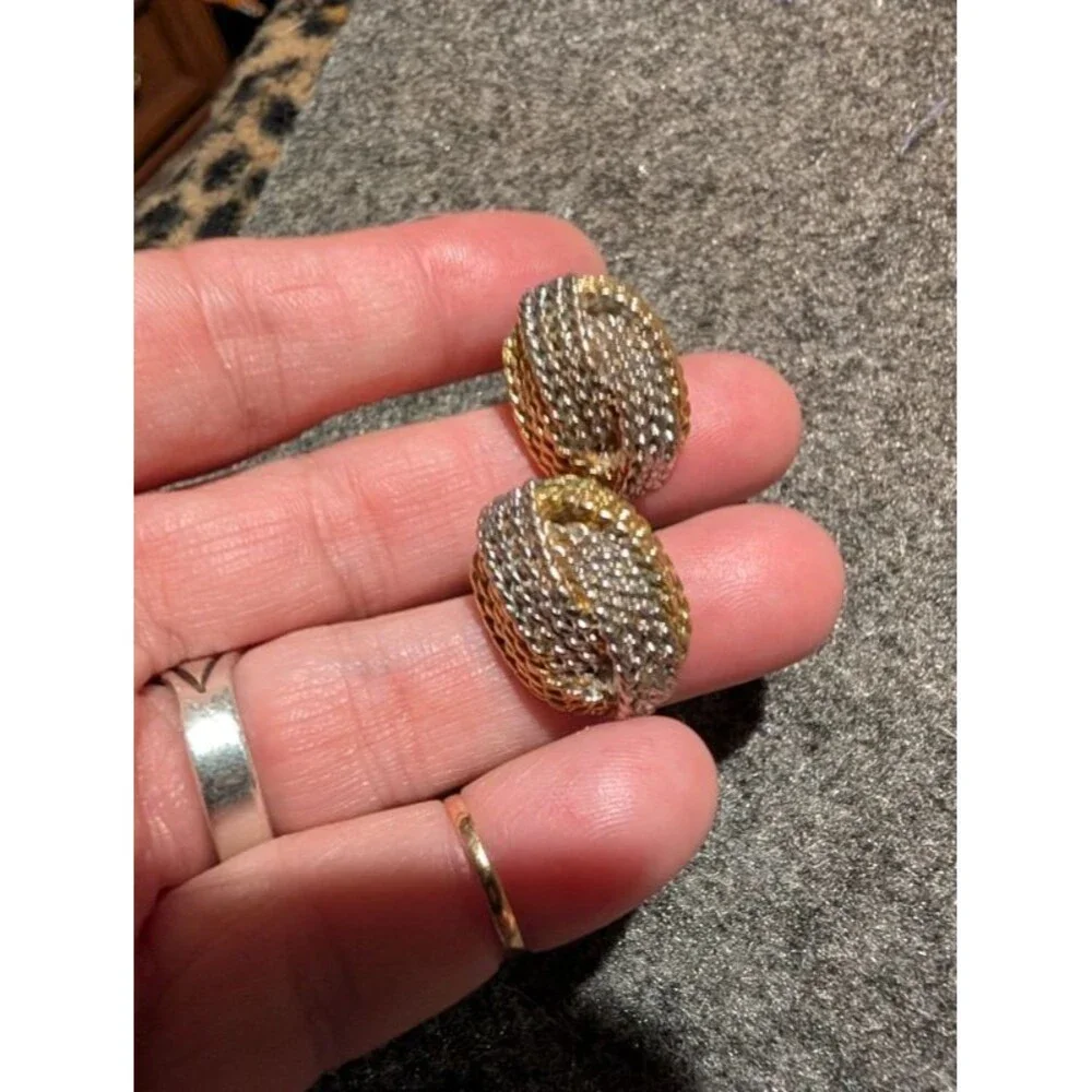 Gold and silver diamond cut earrings